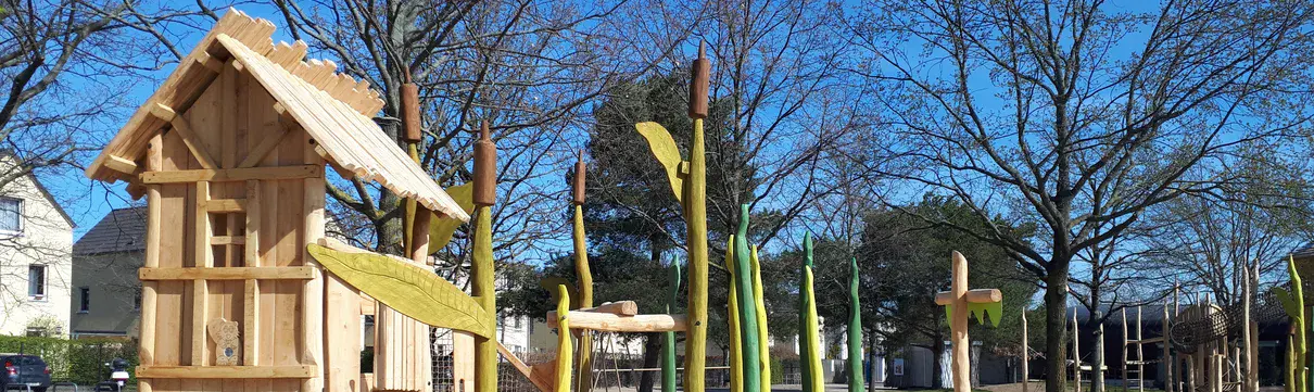 Auf dem Bild ist ein Spielplatz zu sehen