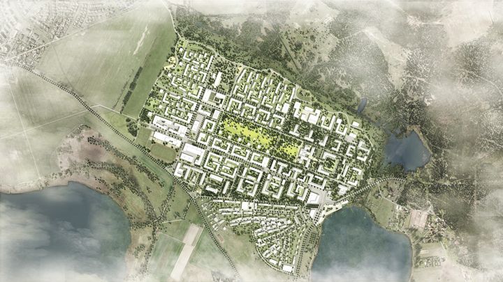 Vogelperspektive des Areals Krampnitz mit Rendering, wo zukünftig Gebäude stehen werden
