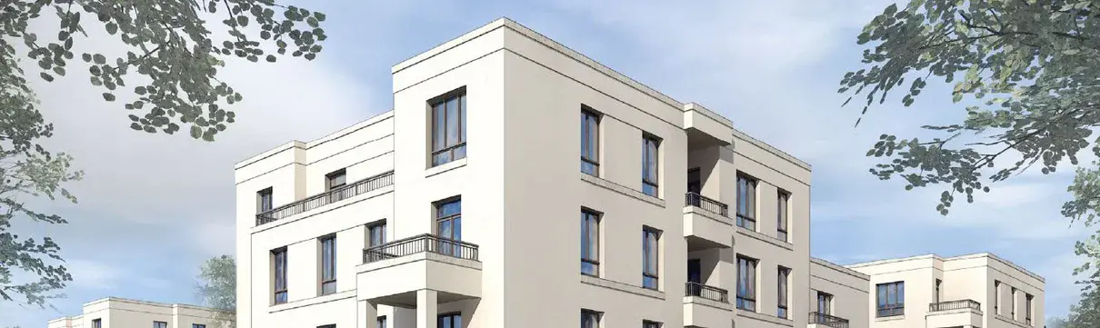 Gebäudeensemble in weiß mit Blätterwerk oben rechts und links
